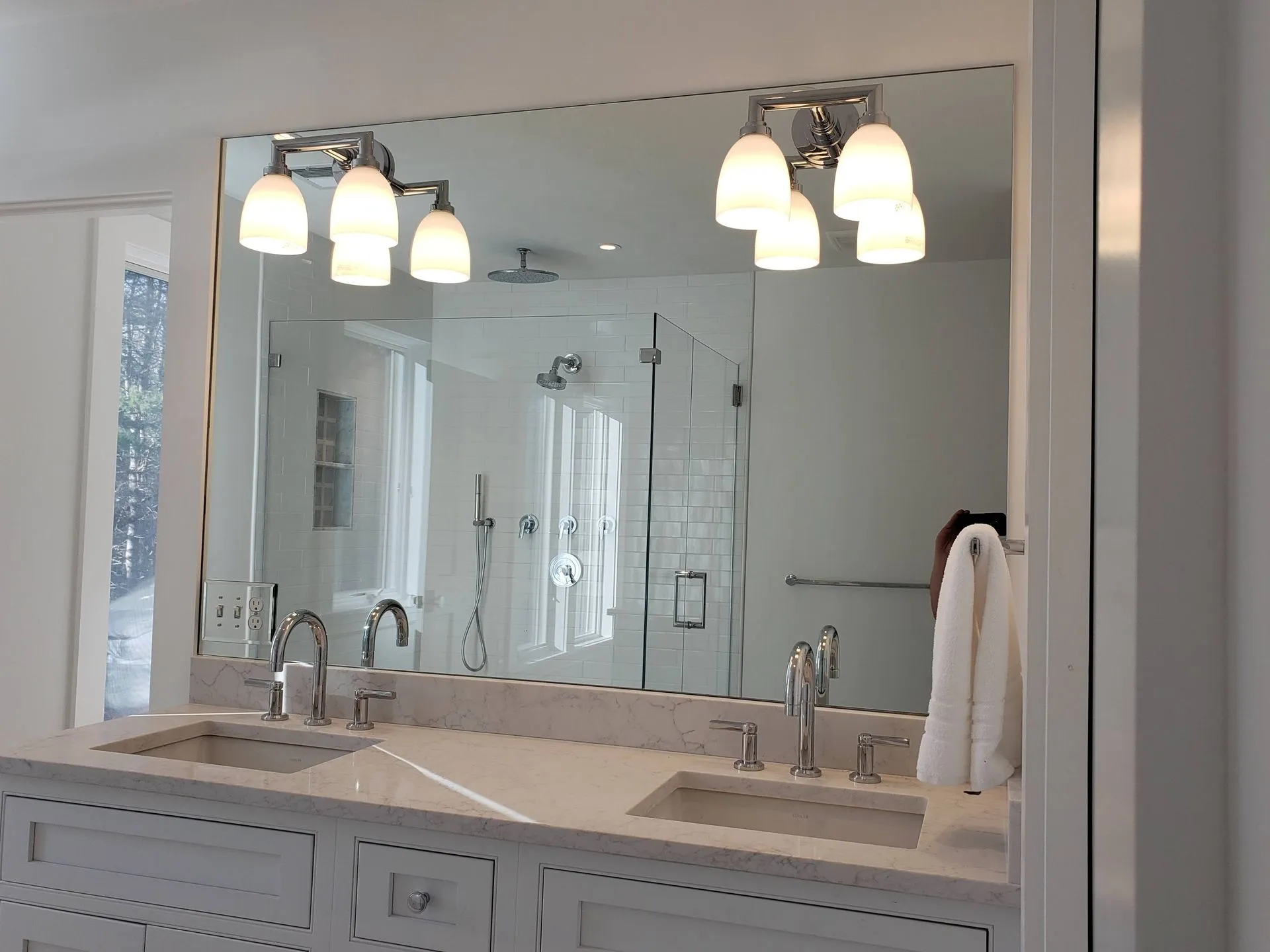 Custom bathroom mirror installation