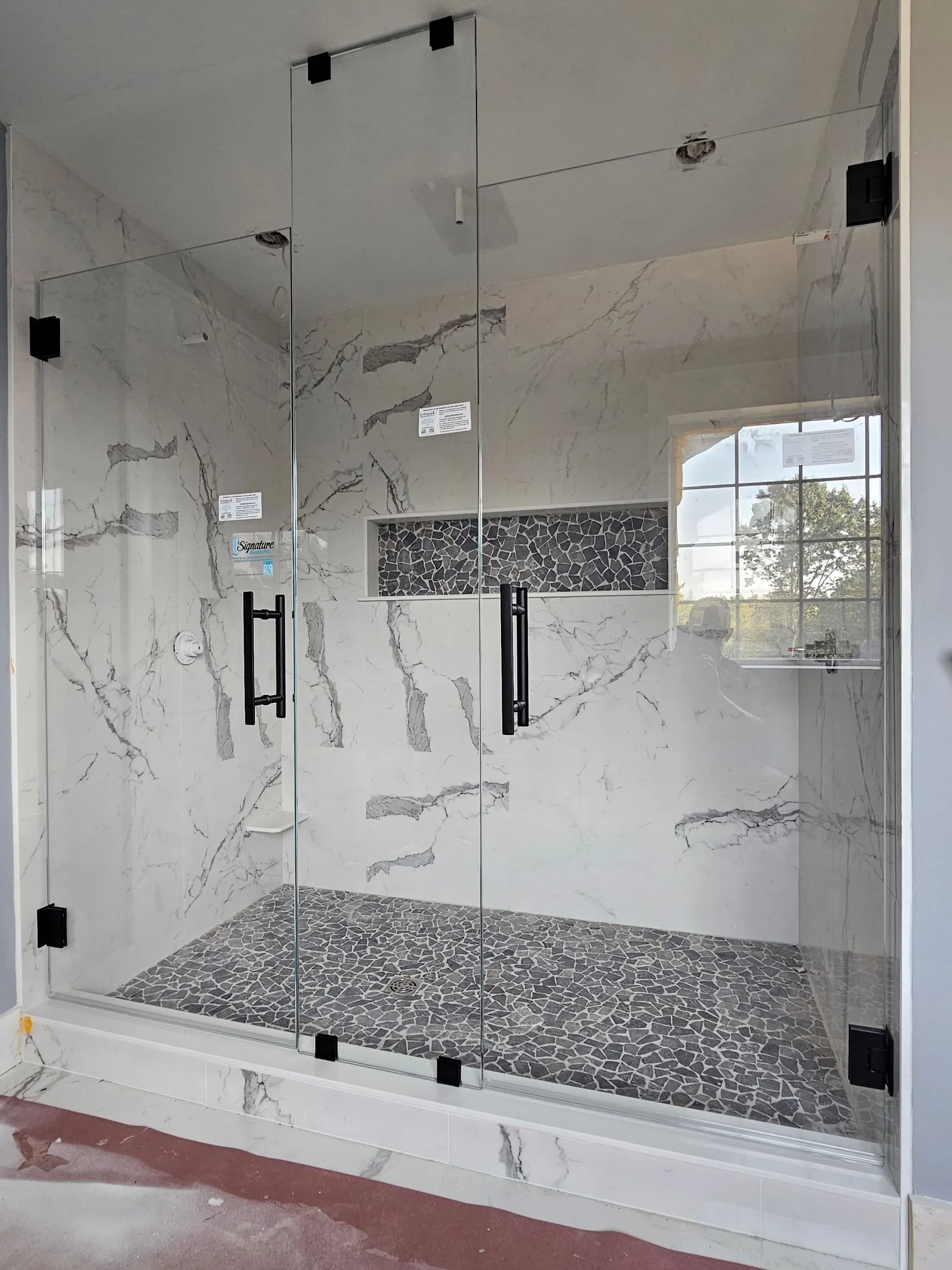 Frameless double door shower